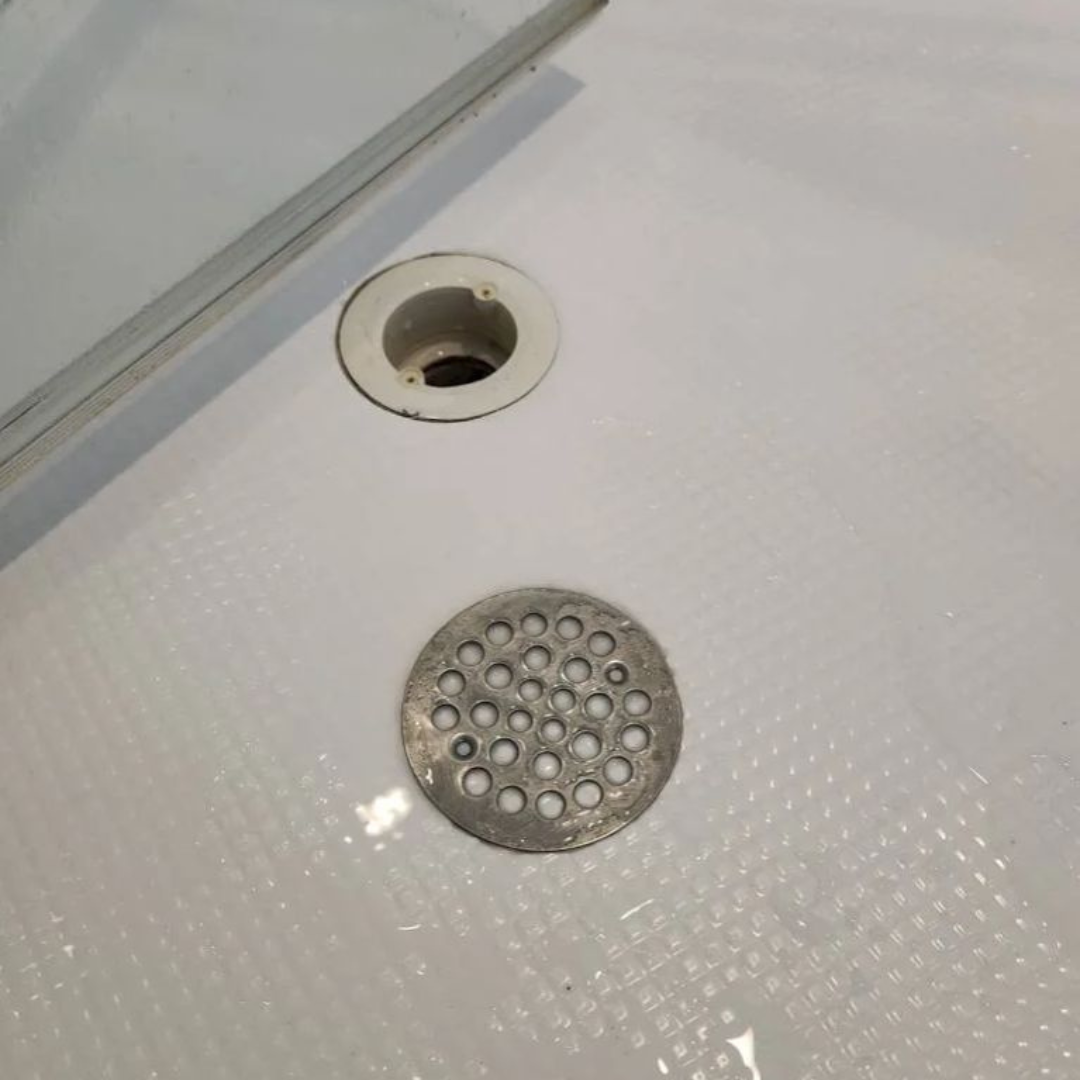 Professional cleaning in Somerville, MA Bathroom drain spotless after professional cleaning in Somerville, MA